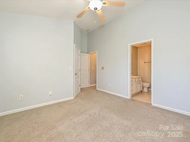 an empty room with a bathroom