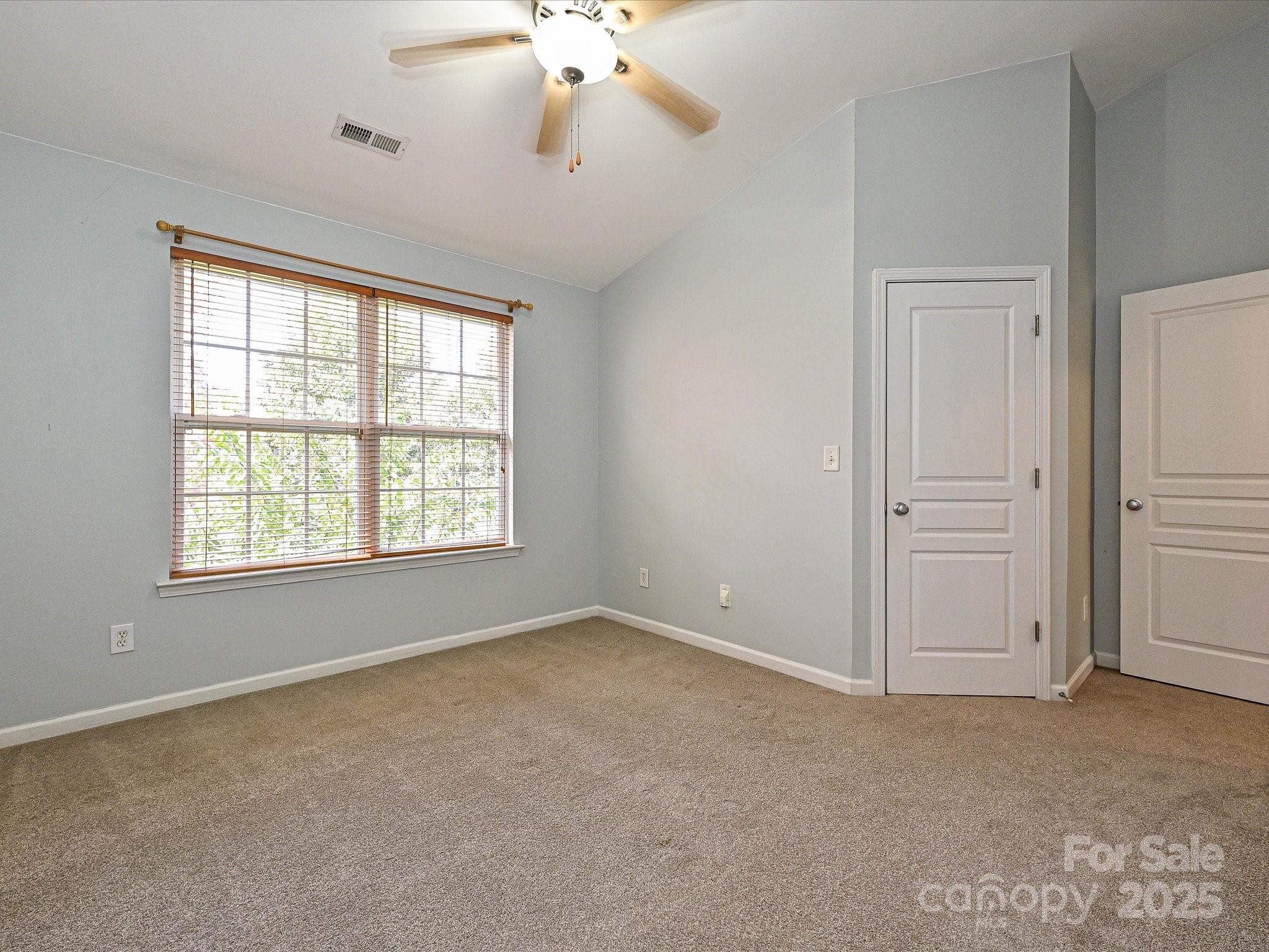 1115 Drummond Lane Matthews, NC 28104 - Photo 14 of 24 a view of an empty room with a window