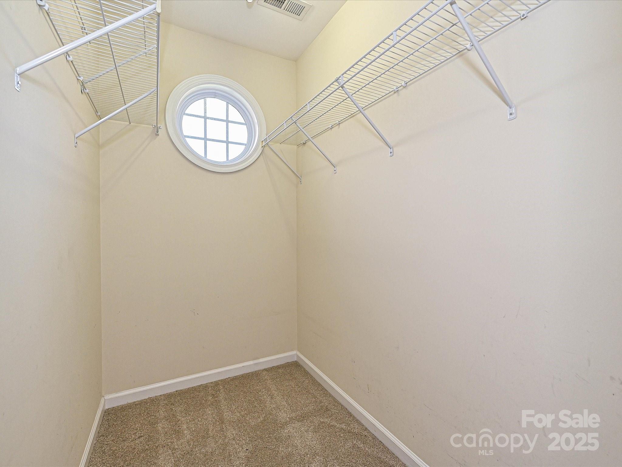 1115 Drummond Lane Matthews, NC 28104 - Photo 17 of 24 a view of small space with racks on the wall