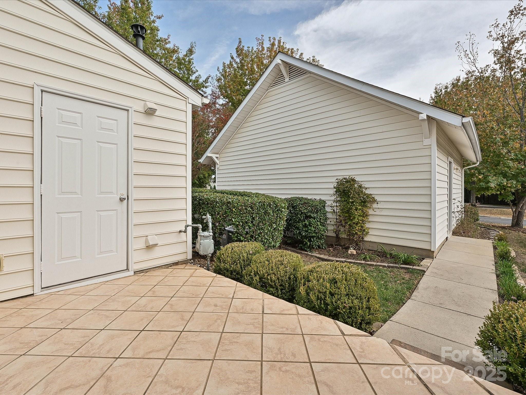 1115 Drummond Lane Matthews, NC 28104 - Photo 21 of 24 a view of a backyard with sitting area