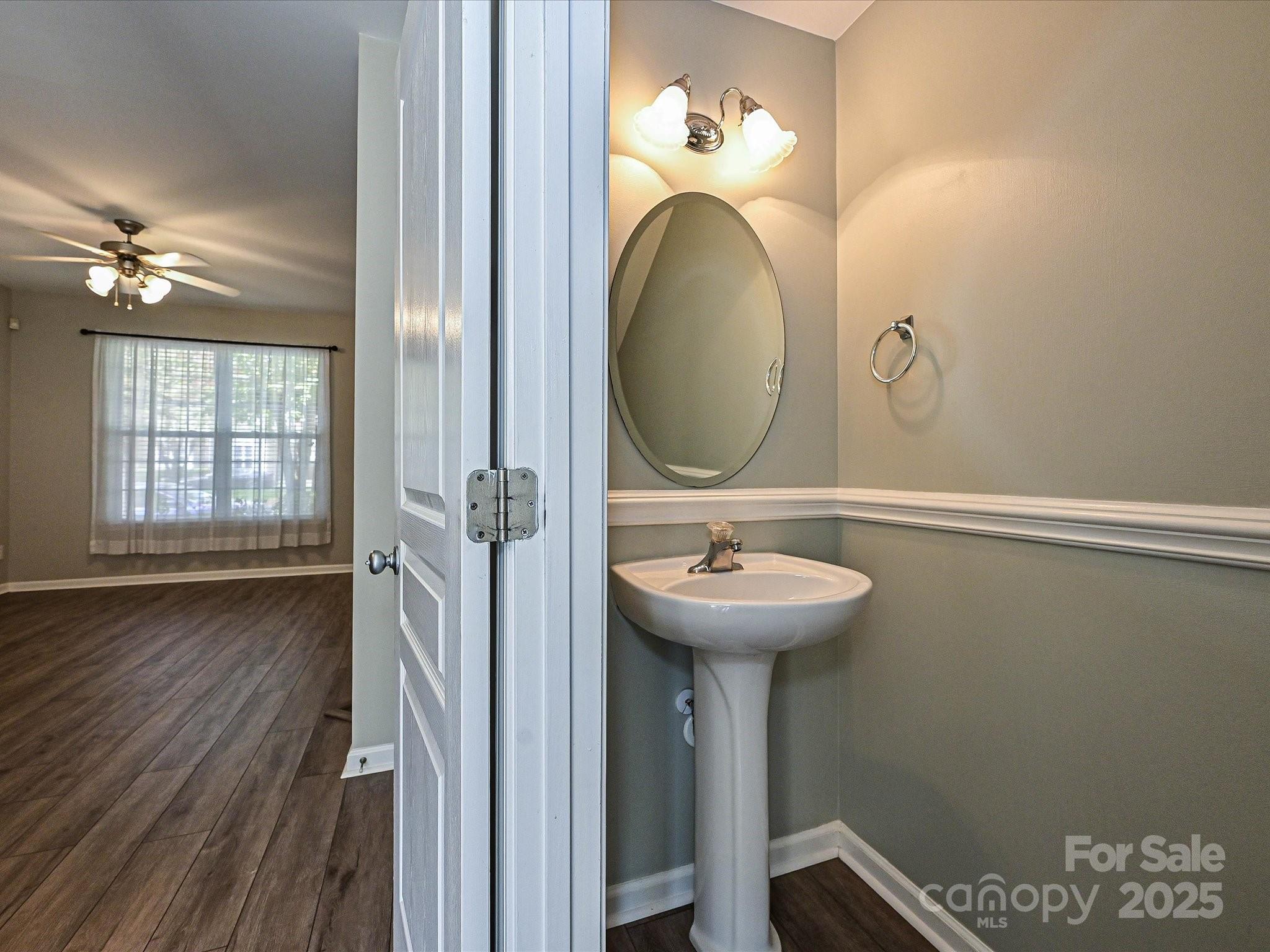 1115 Drummond Lane Matthews, NC 28104 - Photo 8 of 24 a bathroom with a sink mirror and toilet