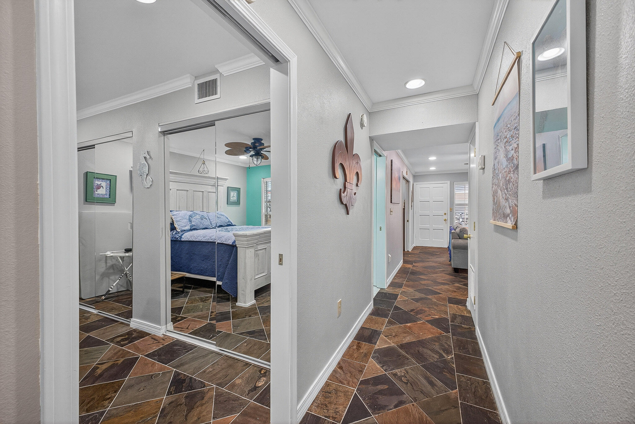 210 Pelham Road, Unit 104B Fort Walton Beach, FL 32547 - Photo 14 of 43 a hallway with dining area and glass doors