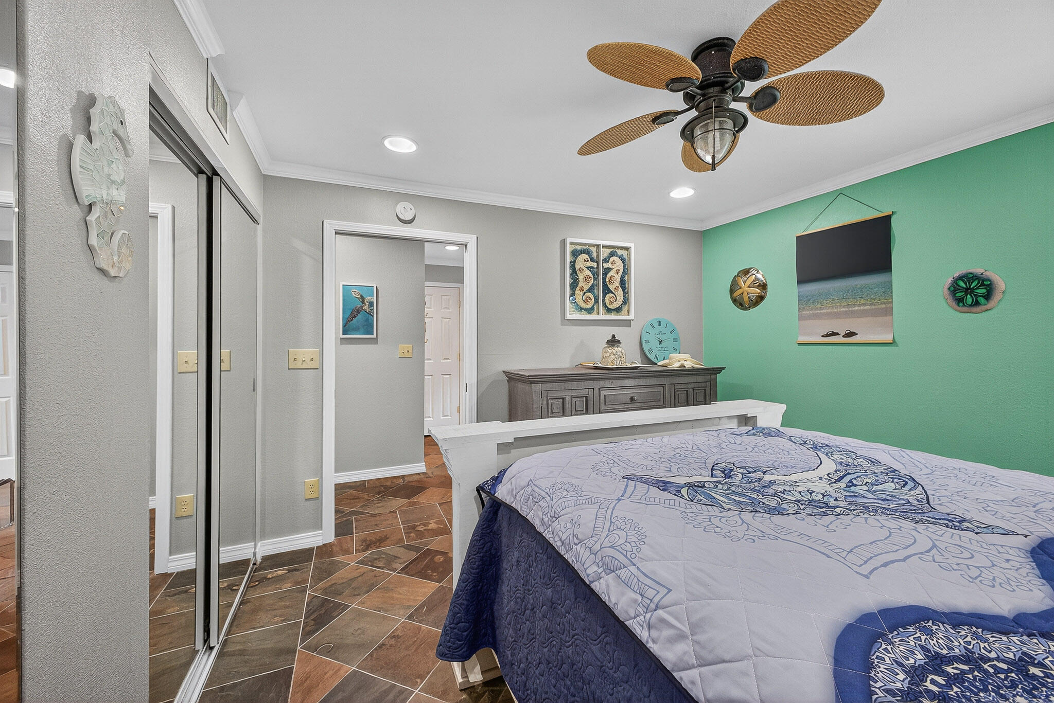 210 Pelham Road, Unit 104B Fort Walton Beach, FL 32547 - Photo 2 of 43 a bedroom with a bed and a view of bathroom