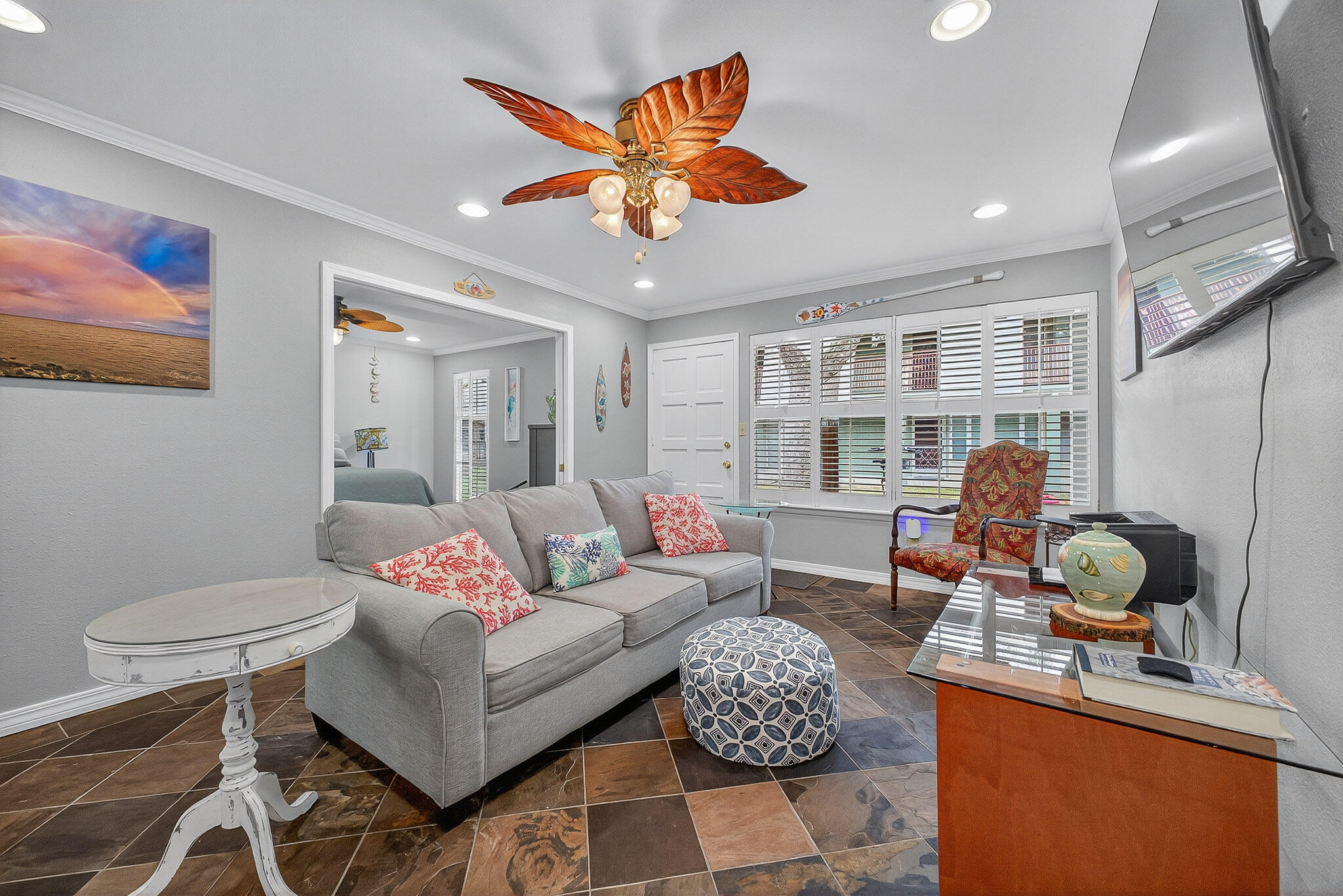 210 Pelham Road, Unit 104B Fort Walton Beach, FL 32547 - Photo 23 of 43 a living room with furniture and a wooden floor