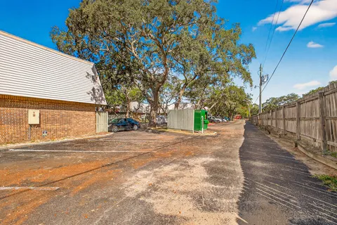 a view of a house with a yard and garage