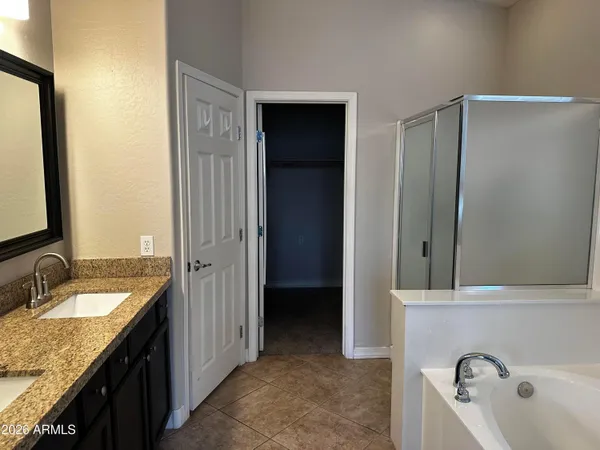a white bath tub sitting next to a window