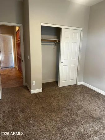 a bathroom with a granite countertop toilet a sink and a bathtub