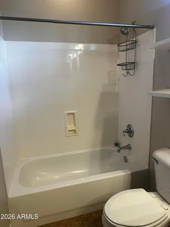 en empty room with windows