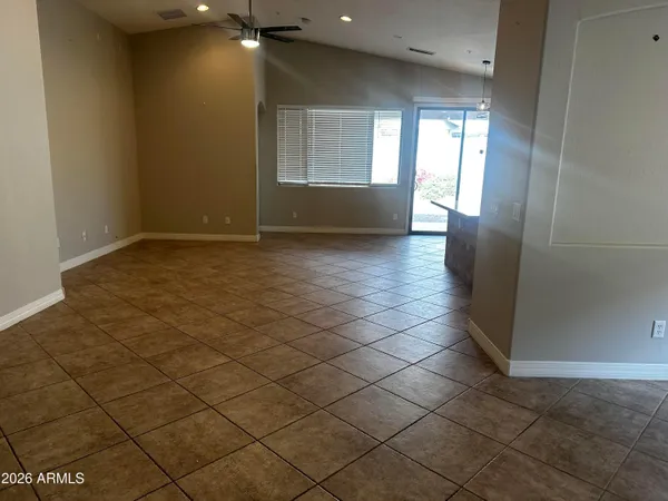 a view of an empty room and window