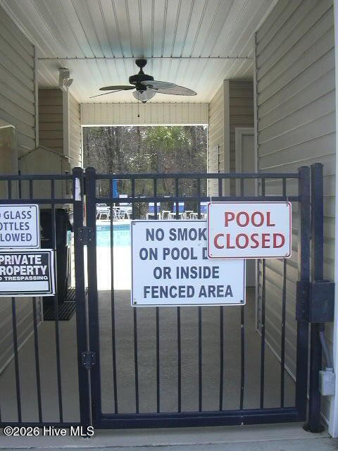 144 Freeboard Lane Calabash, NC 28467 - Photo 22 of 27 Pool entrance