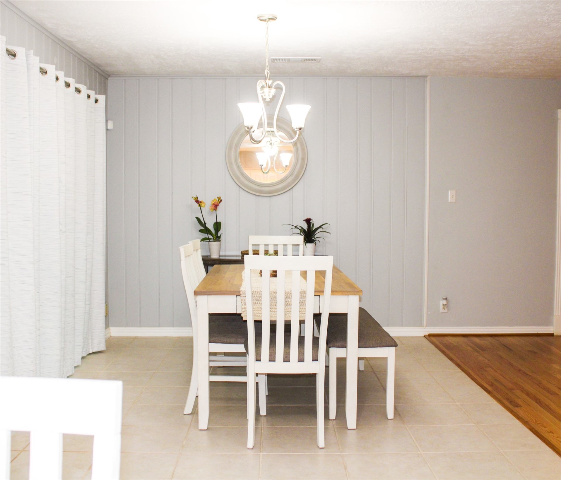 8910 Greiner Drive Houston, TX 77080 - Photo 8 of 21 a view of a dining room with furniture and a mirror