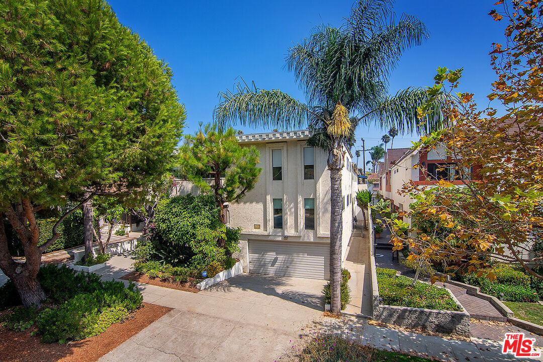 923 17th Street, Unit 3 Santa Monica, CA 90403 - Photo 2 of 22 a front view of a house with a tree
