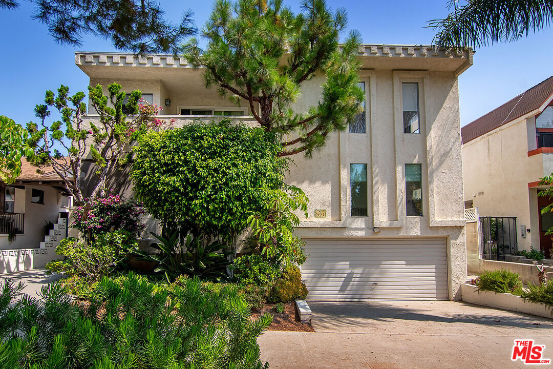 923 17th Street, Unit 3 Santa Monica, CA 90403 - Photo 3 of 22 front view of a house with a tree