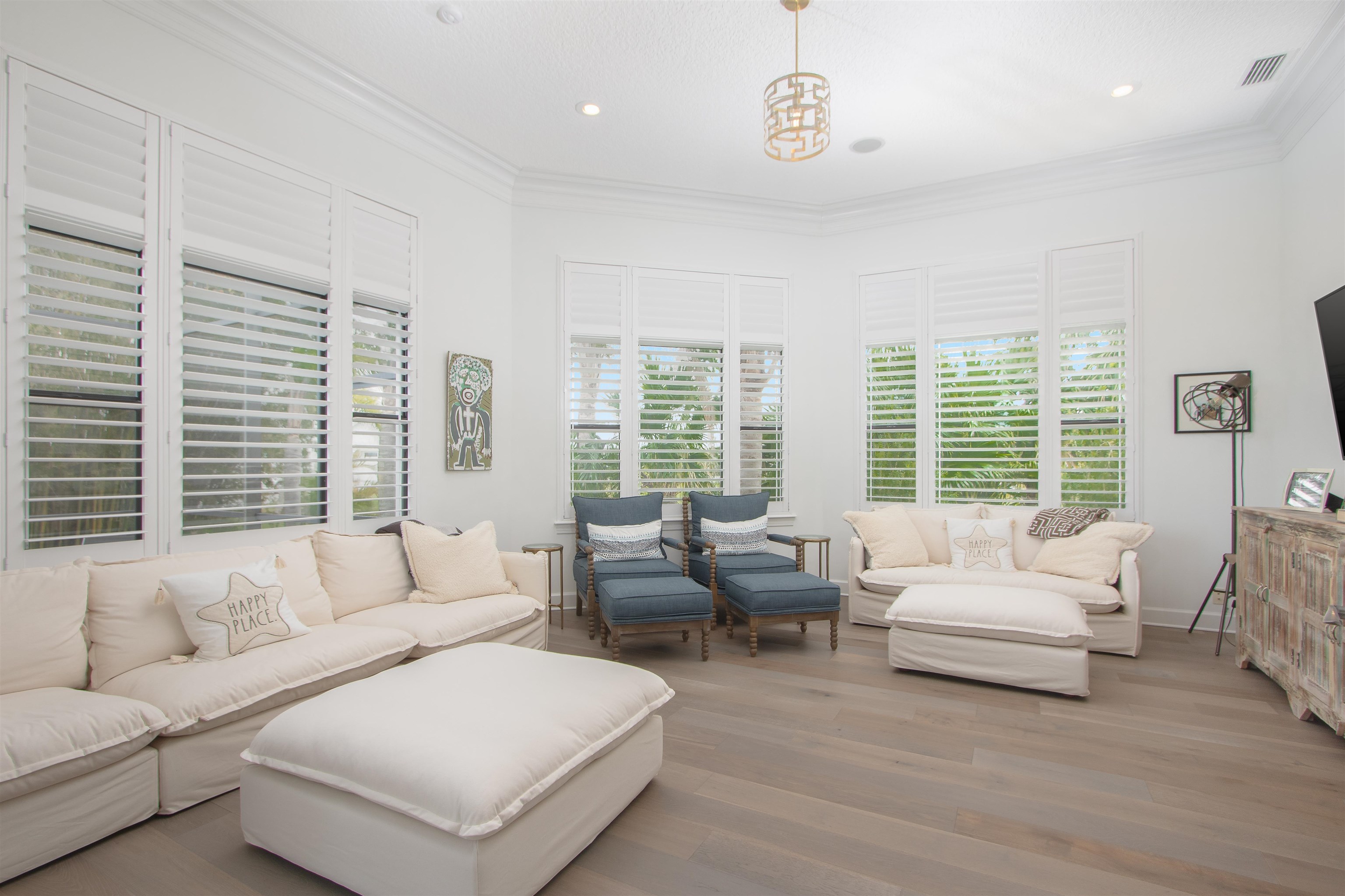 151 Pelican Reef Drive St. Augustine, FL 32080 - Photo 14 of 29 a living room with furniture and large windows