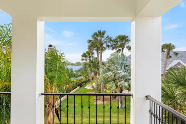 a view of a balcony with a plant