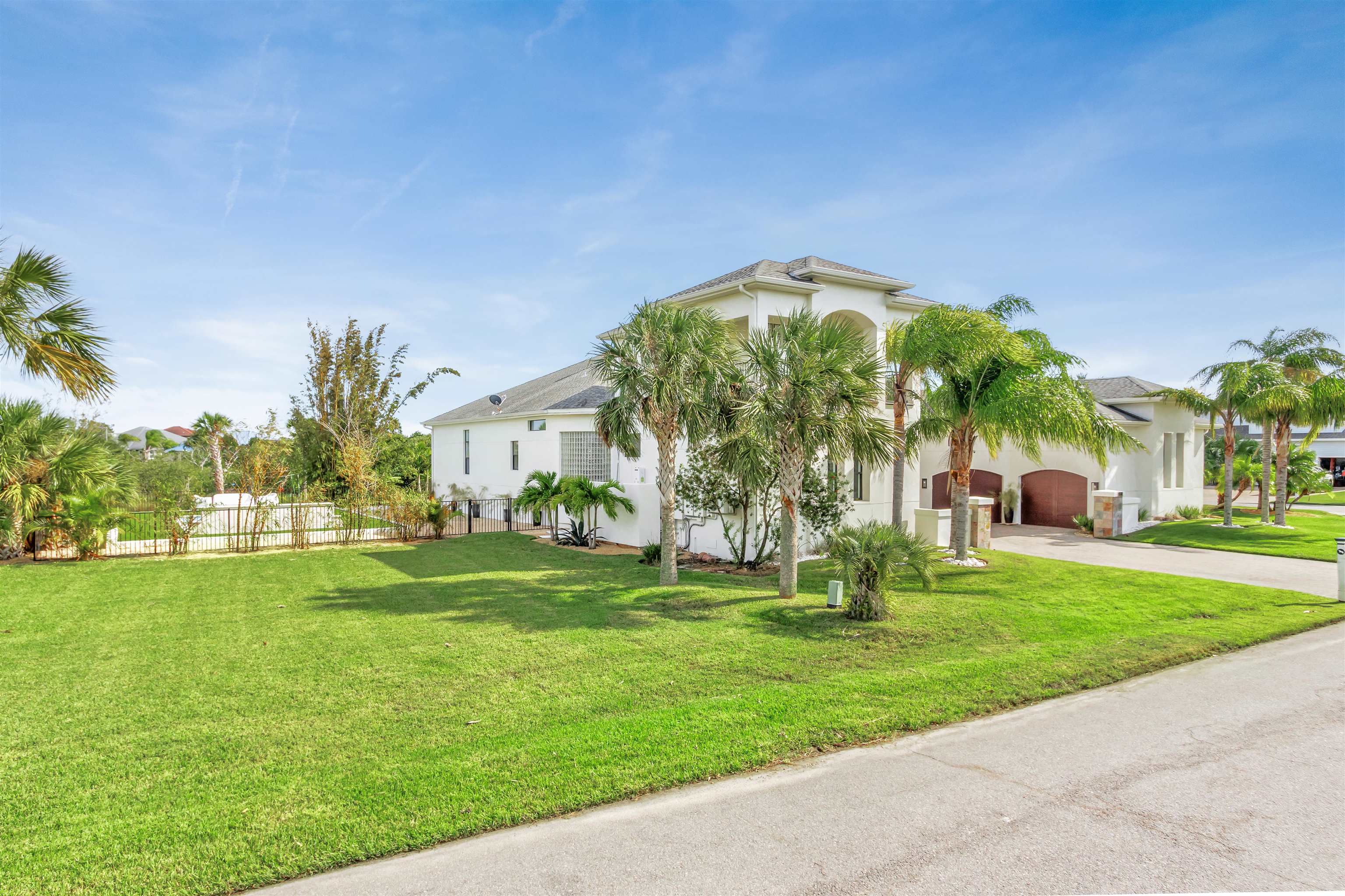 151 Pelican Reef Drive St. Augustine, FL 32080 - Photo 19 of 29 a garden with trees in front of it