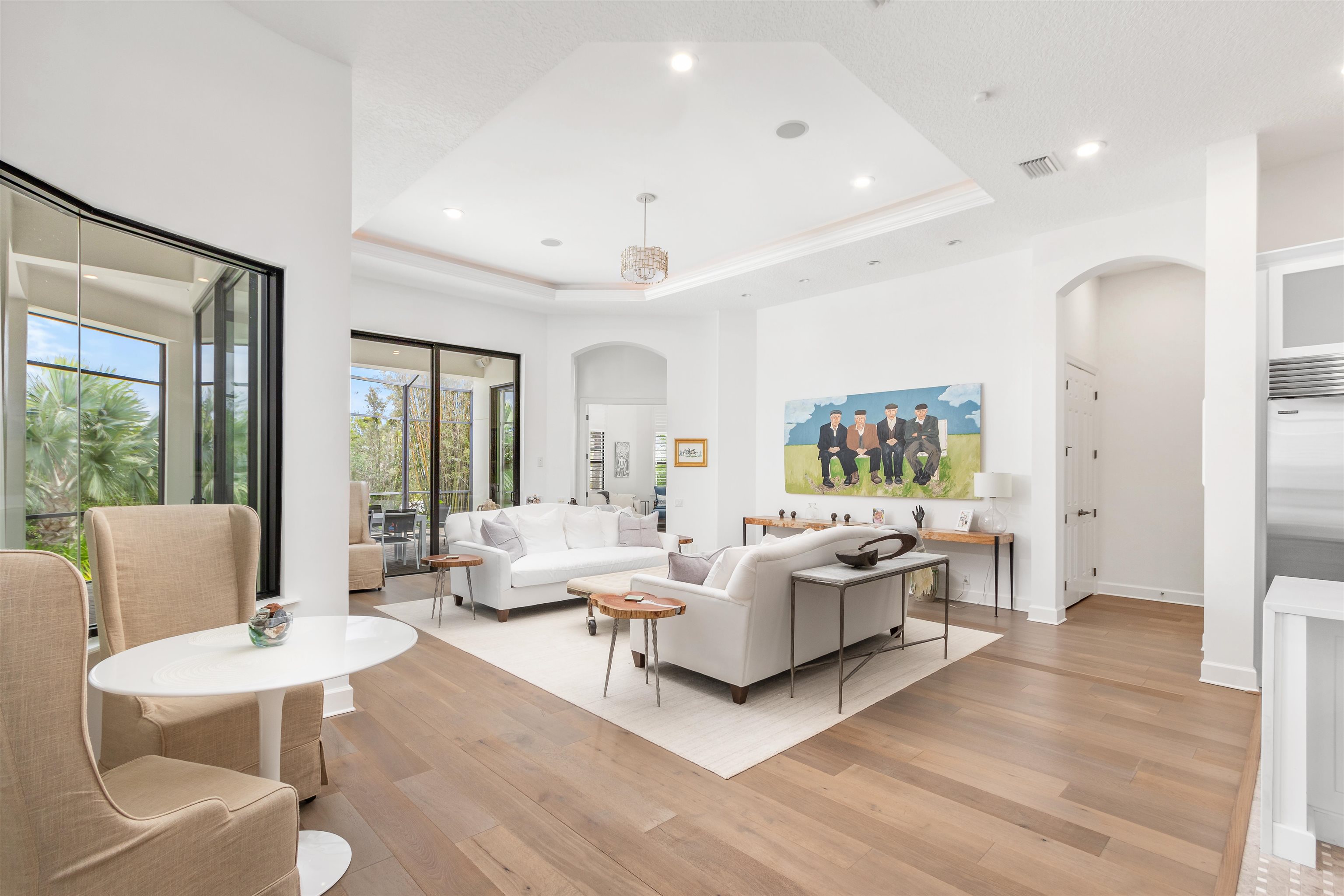 151 Pelican Reef Drive St. Augustine, FL 32080 - Photo 7 of 29 a living room with fireplace furniture and a large window