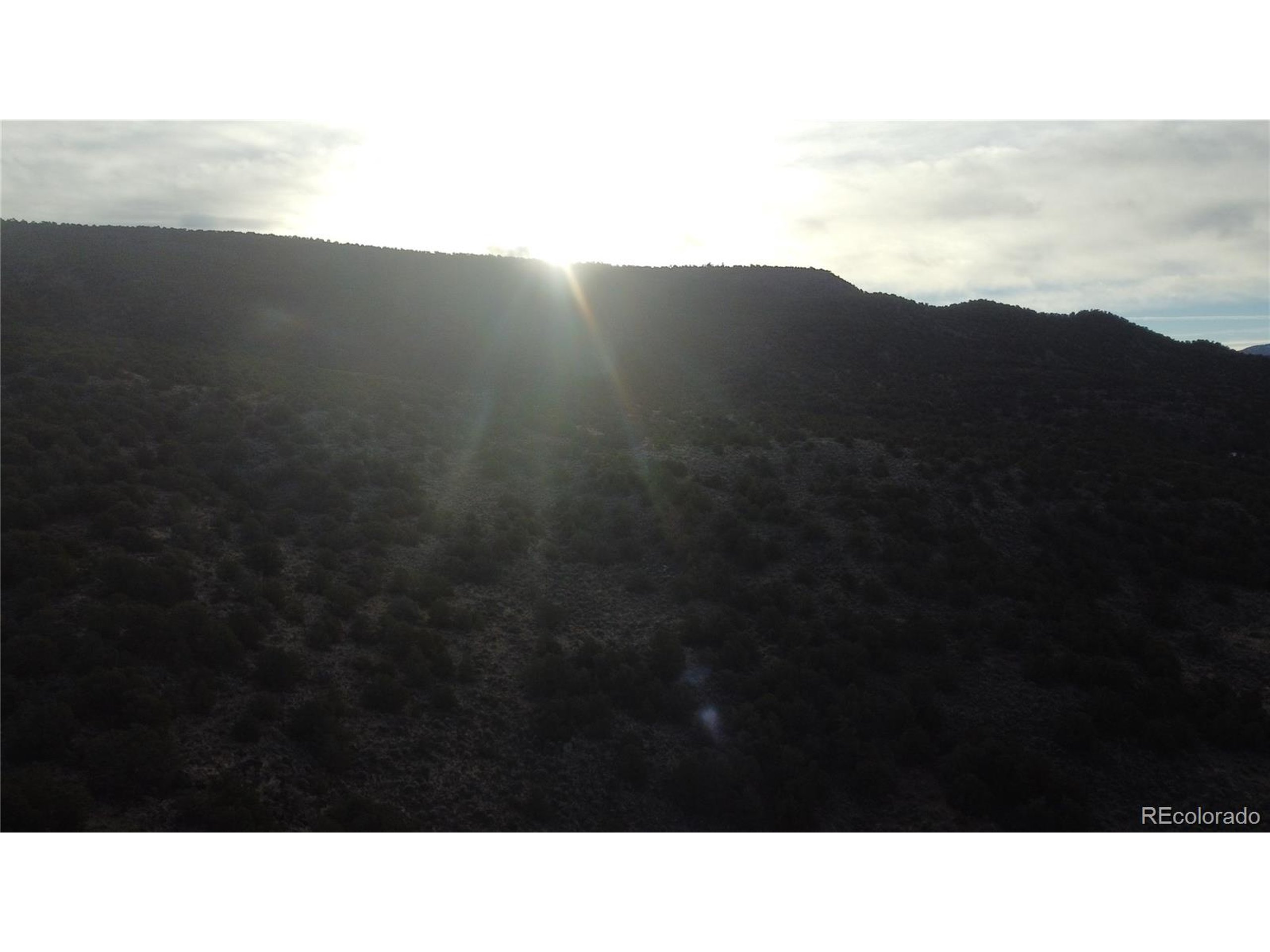 54 Old Stage Coach Road San Luis, CO 81152 - Photo 14 of 20 a black and white photo of a sky