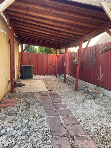 a view of a wooden fence
