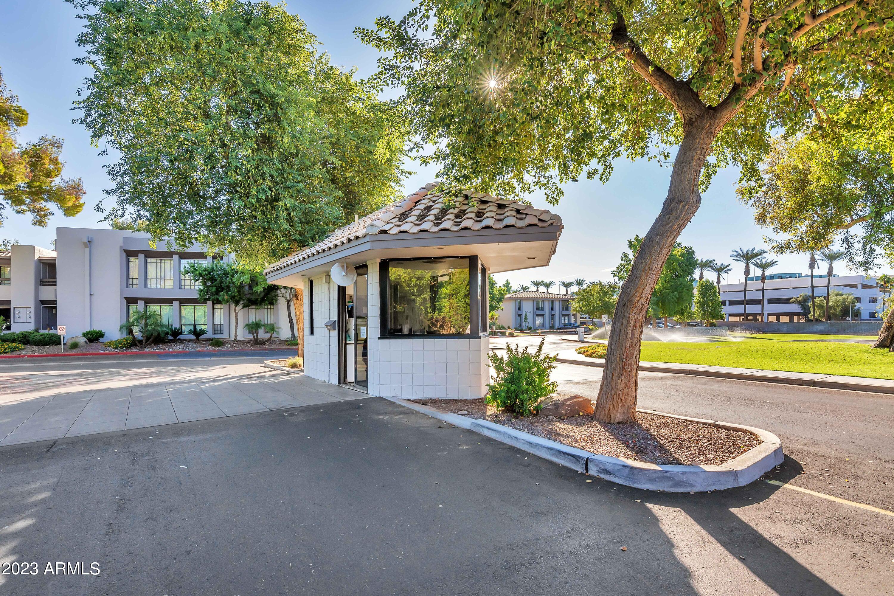 5223 North 24th Street, Unit 105 Phoenix, AZ 85016 - Photo 21 of 22 a house with swimming pool in front of it