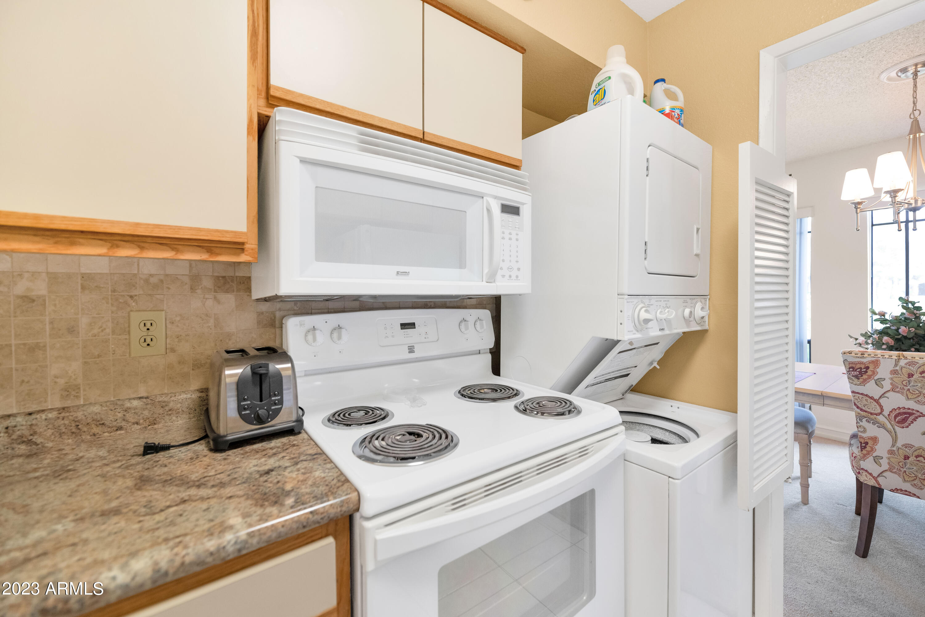 5223 North 24th Street, Unit 105 Phoenix, AZ 85016 - Photo 8 of 22 a utility room with dryer and washer