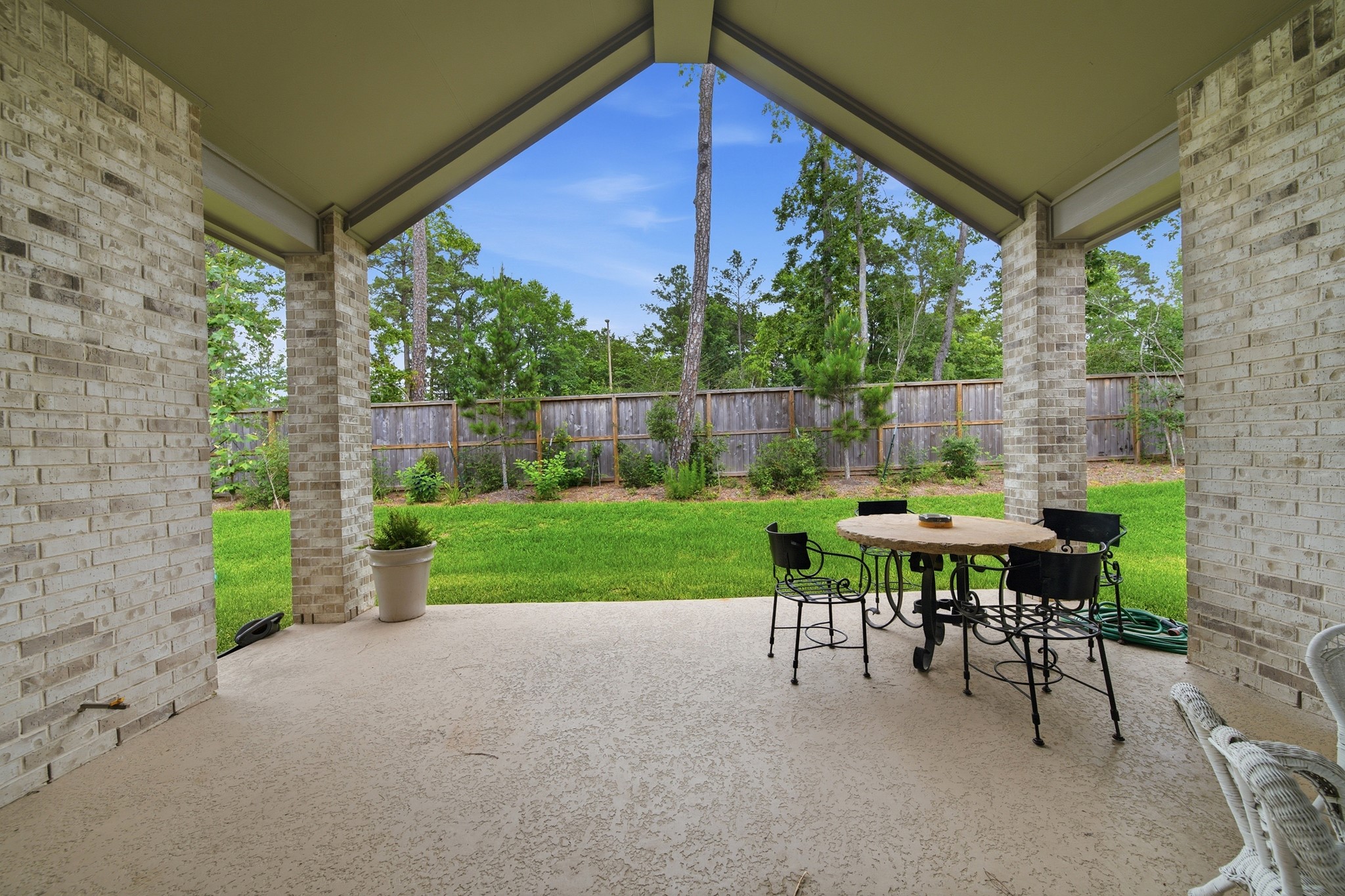 218 Wooded Rill Court Conroe, TX 77318 - Photo 40 of 50 Large Covered Outdoor Patio