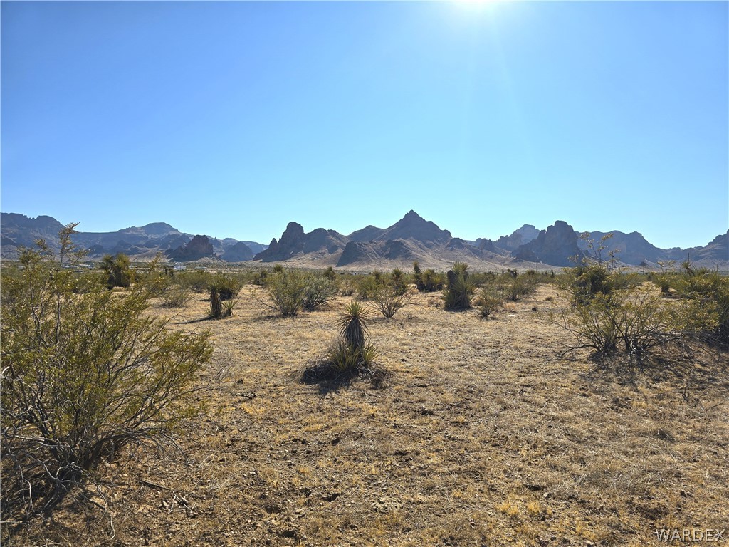 2821 Hopi Road Golden Valley, AZ 86413 - Photo 2 of 30 a view of a large mountain with a mountain in the background