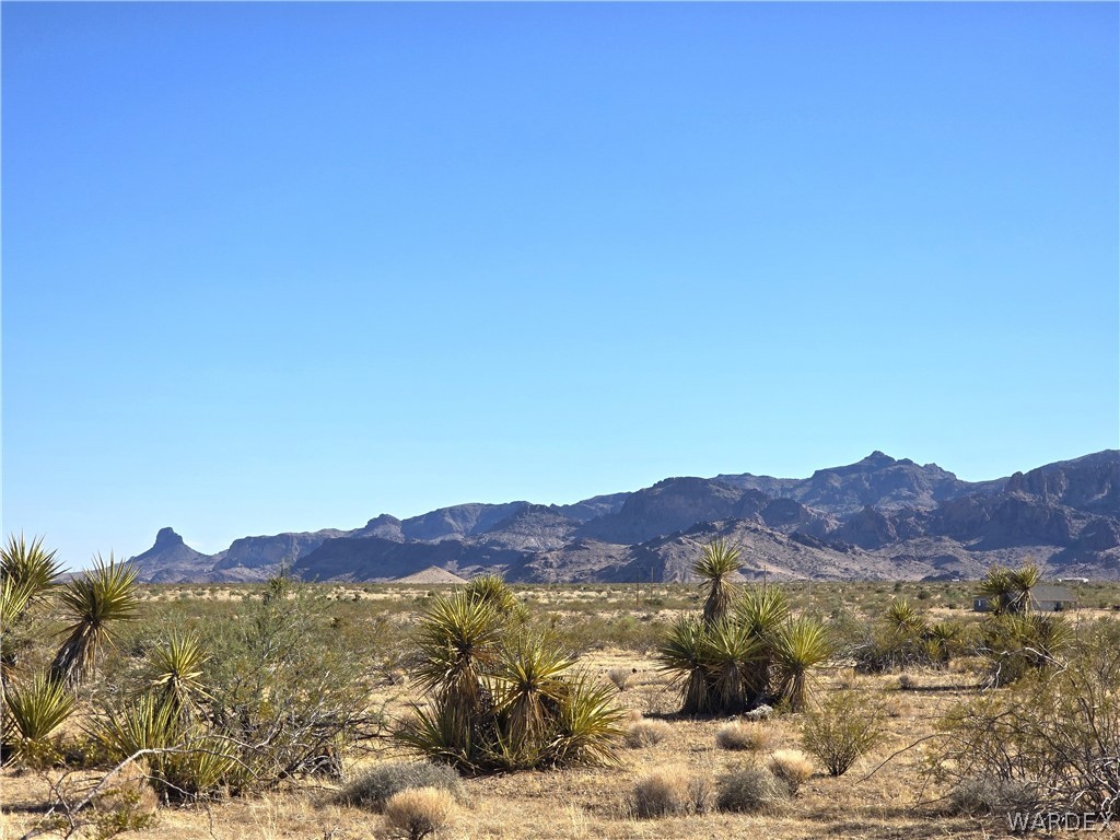2821 Hopi Road Golden Valley, AZ 86413 - Photo 7 of 30 a view of a mountain with a swimming pool and mountains