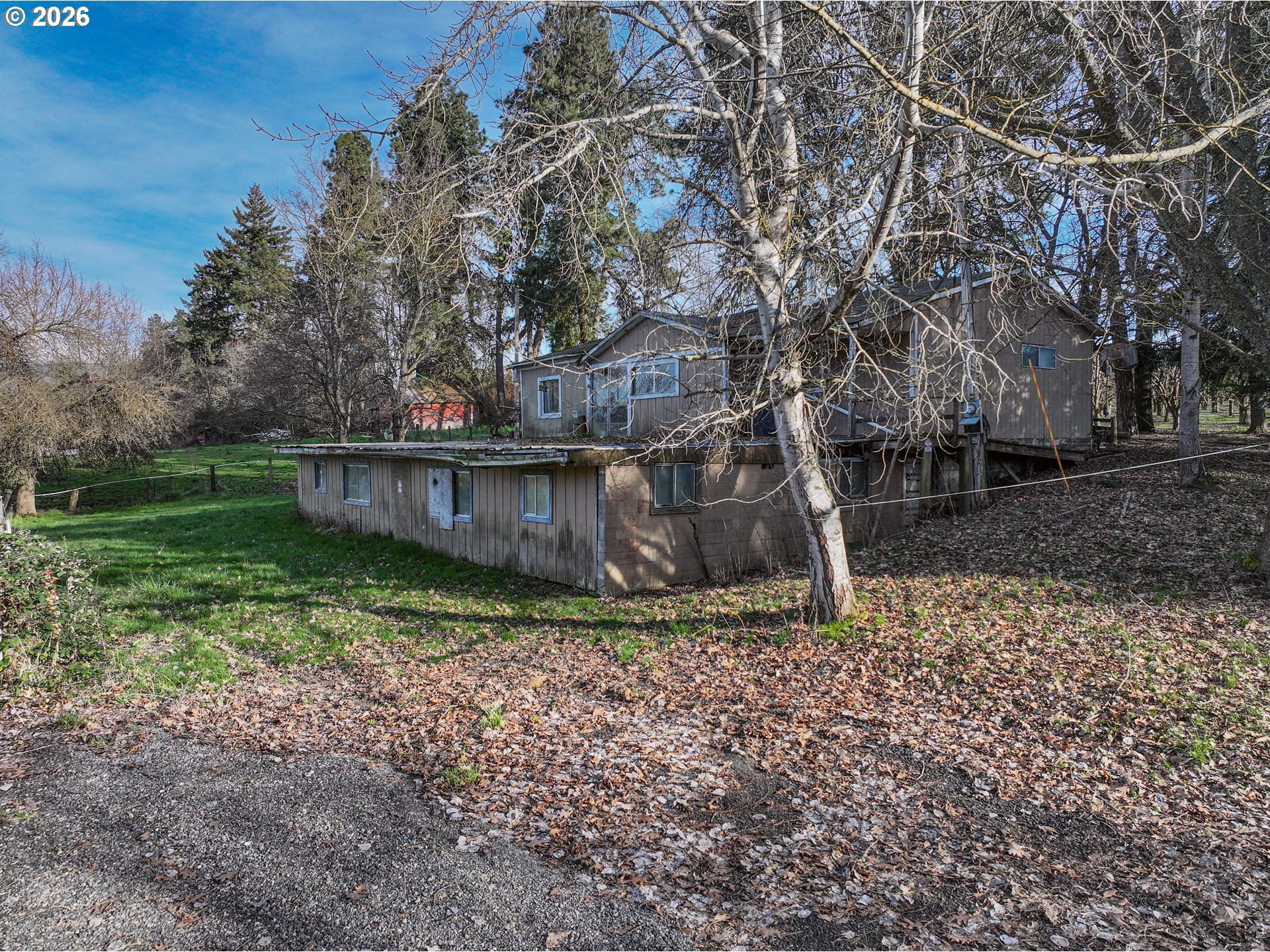 2739 Wyeast Road Hood River, OR 97031 - Photo 28 of 28 a backyard of a house with lots of green space