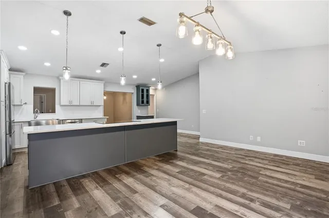 a close view of dining table and chairs
