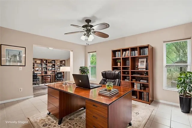 a bathroom with a granite countertop sink toilet a mirror and shower