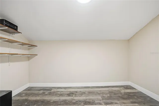 a view of a water with a dry yard