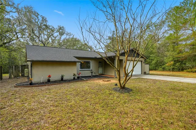 a view of a hallway with wooden shelves