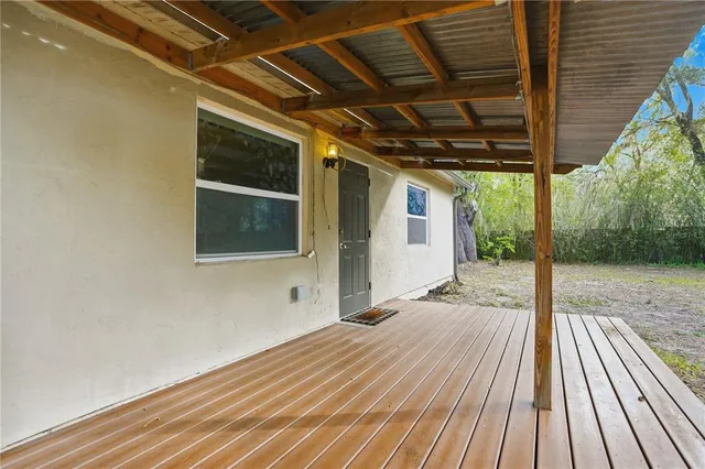 a house with a tree in the background