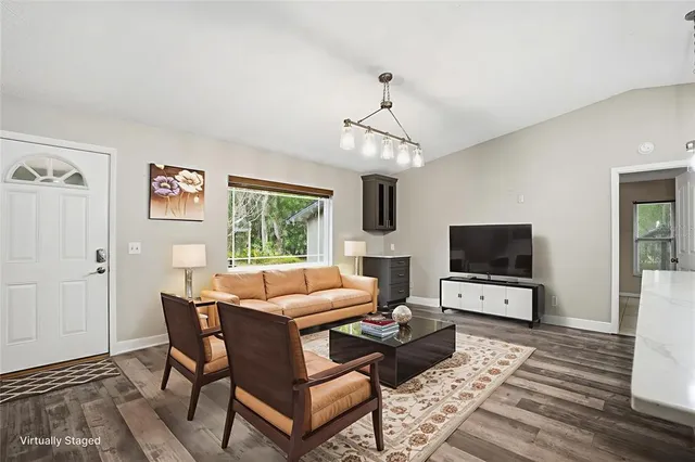 a large kitchen with stainless steel appliances kitchen island a large island in the center