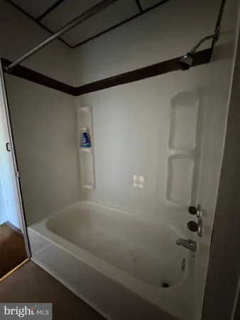 a bathroom with a bathtub