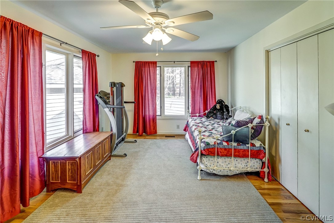 14201 Regatta Pointe Road Midlothian, VA 23112 - Photo 15 of 18 Bedroom has hardwood floors, ceiling fan w/light a