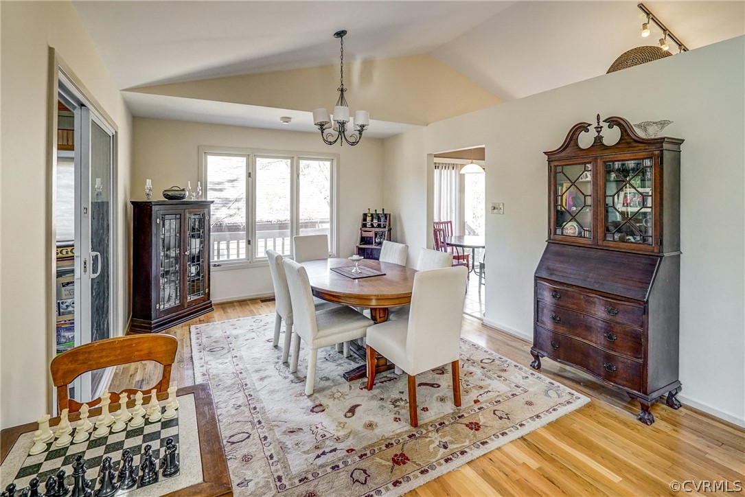 14201 Regatta Pointe Road Midlothian, VA 23112 - Photo 6 of 18 Dining room has hardwood floors, vaulted ceiling a