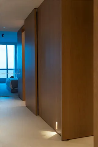 a view of a room with a hallway