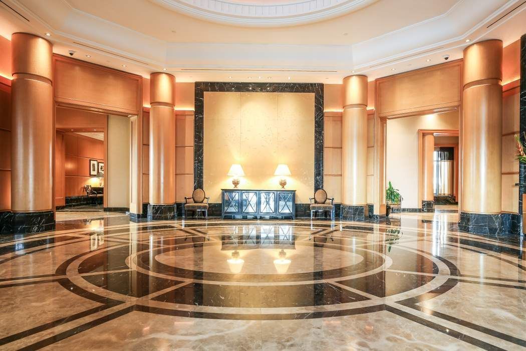 220 Riverside Boulevard, Unit 5L Manhattan, NY 10069 - Photo 11 of 16 a view of a swimming pool with a large window and chairs