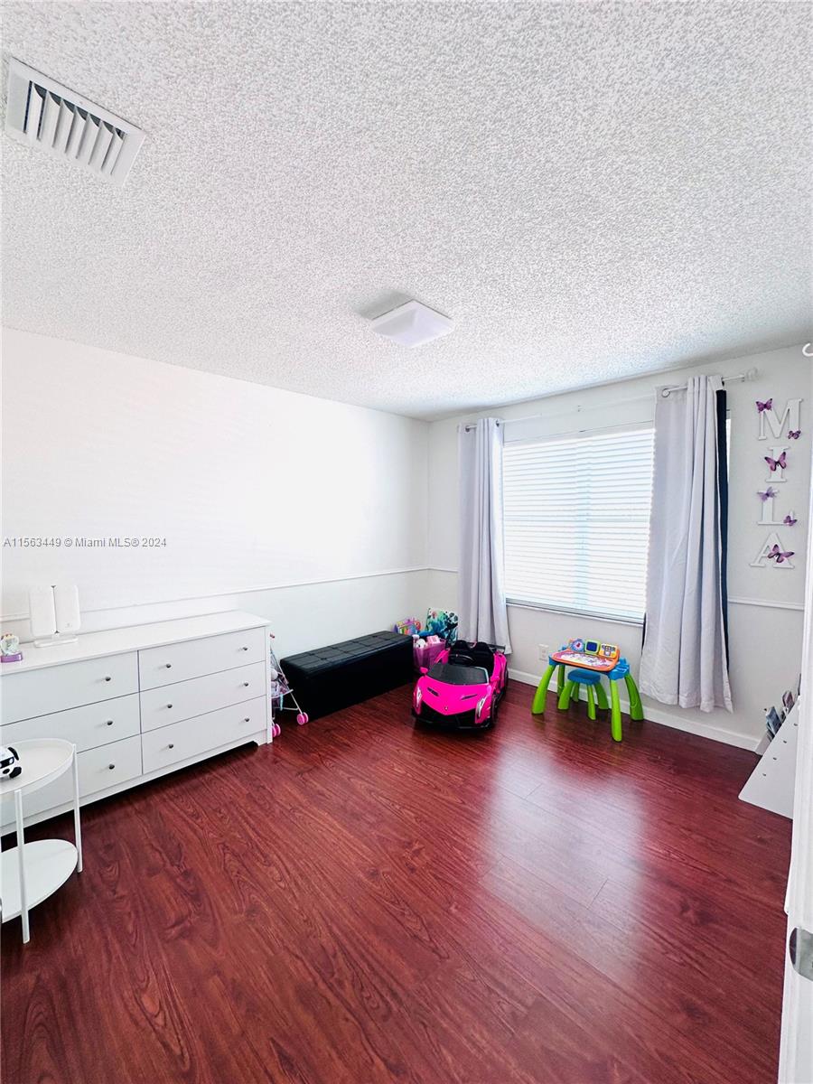 17456 Southwest 20th Street Miramar, FL 33029 - Photo 21 of 34 a view of play room with toys