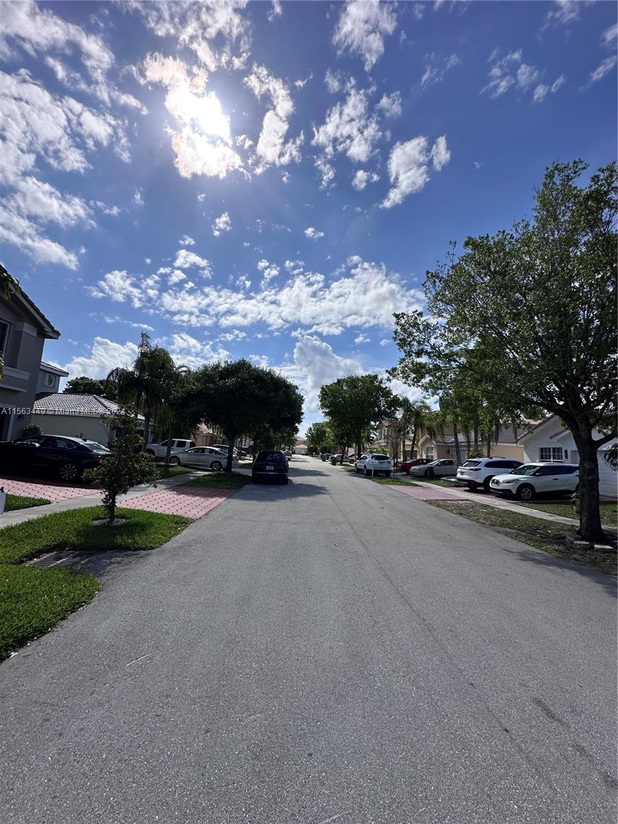 17456 Southwest 20th Street Miramar, FL 33029 - Photo 33 of 34 a view of street with parked cars
