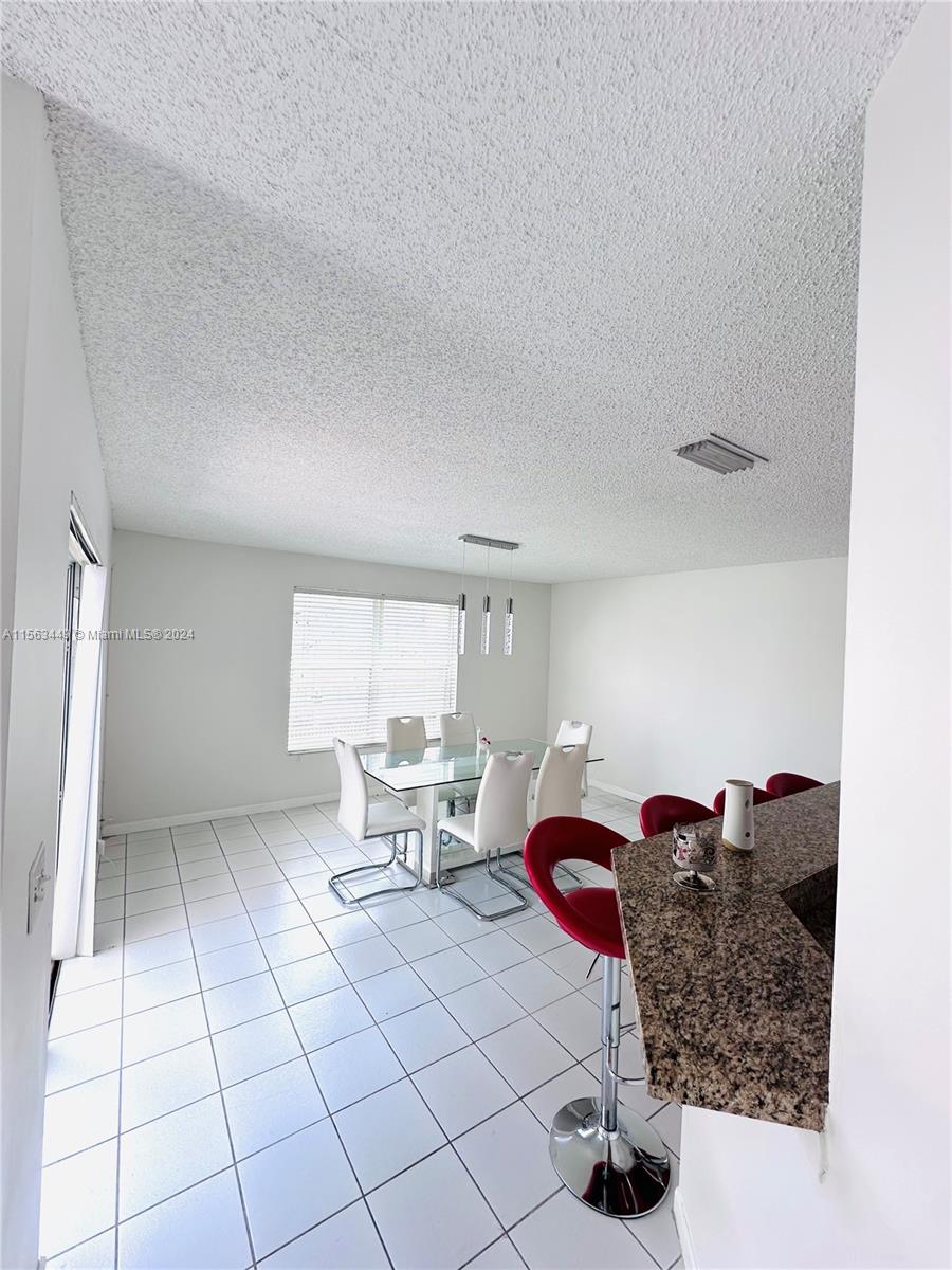 17456 Southwest 20th Street Miramar, FL 33029 - Photo 8 of 34 a living room with furniture