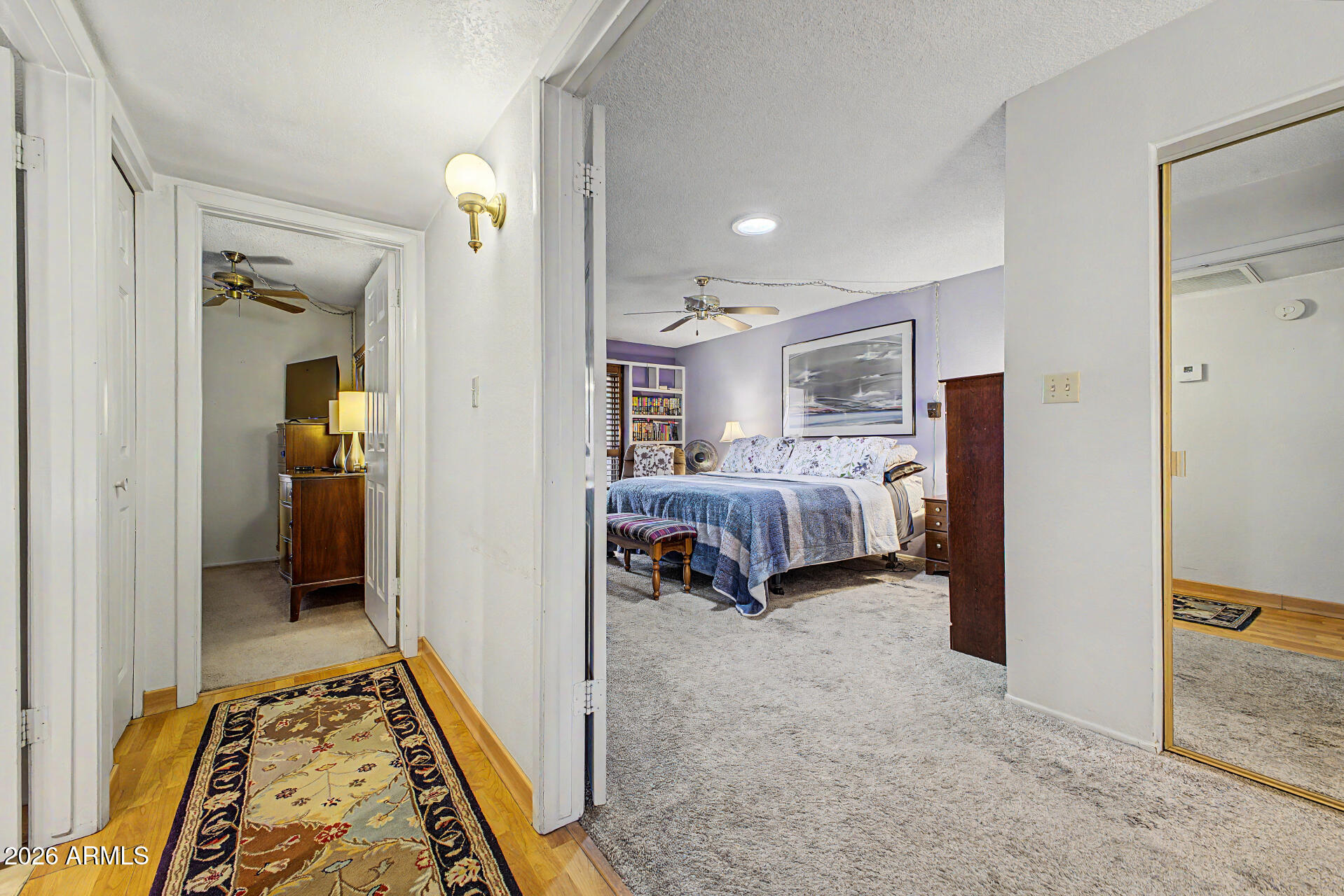 2659 West Hearn Road Phoenix, AZ 85023 - Photo 12 of 25 a bedroom with bed and furniture