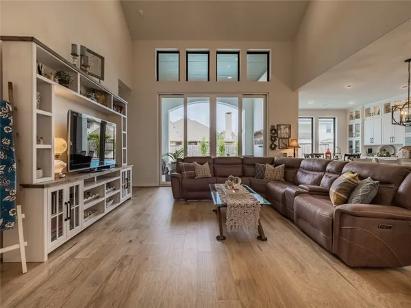 a view of swimming pool with seating area