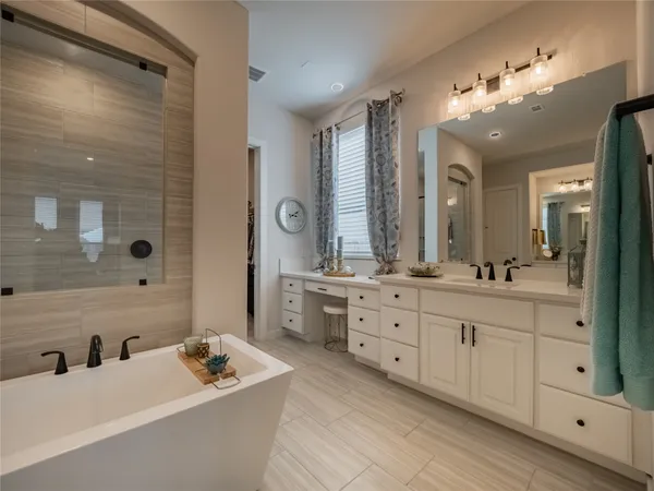 a bedroom with a bed and a cabinets