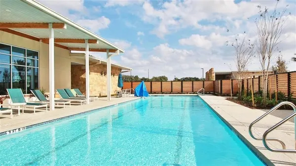 a view of a house with a swimming pool