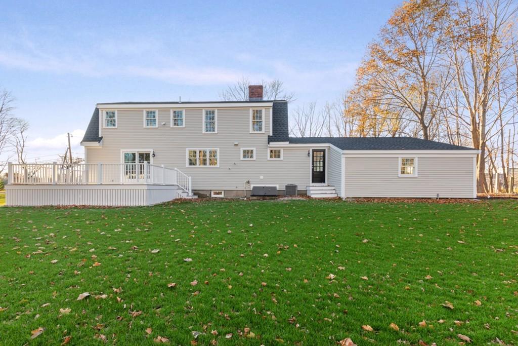 52 Union Street Hingham, MA 02043 - Photo 19 of 21 a view of a house with a backyard