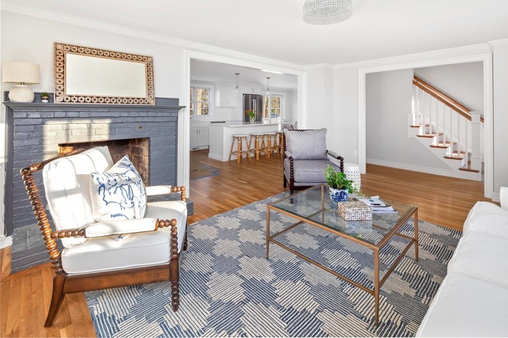 52 Union Street Hingham, MA 02043 - Photo 7 of 21 a living room with furniture and a fireplace