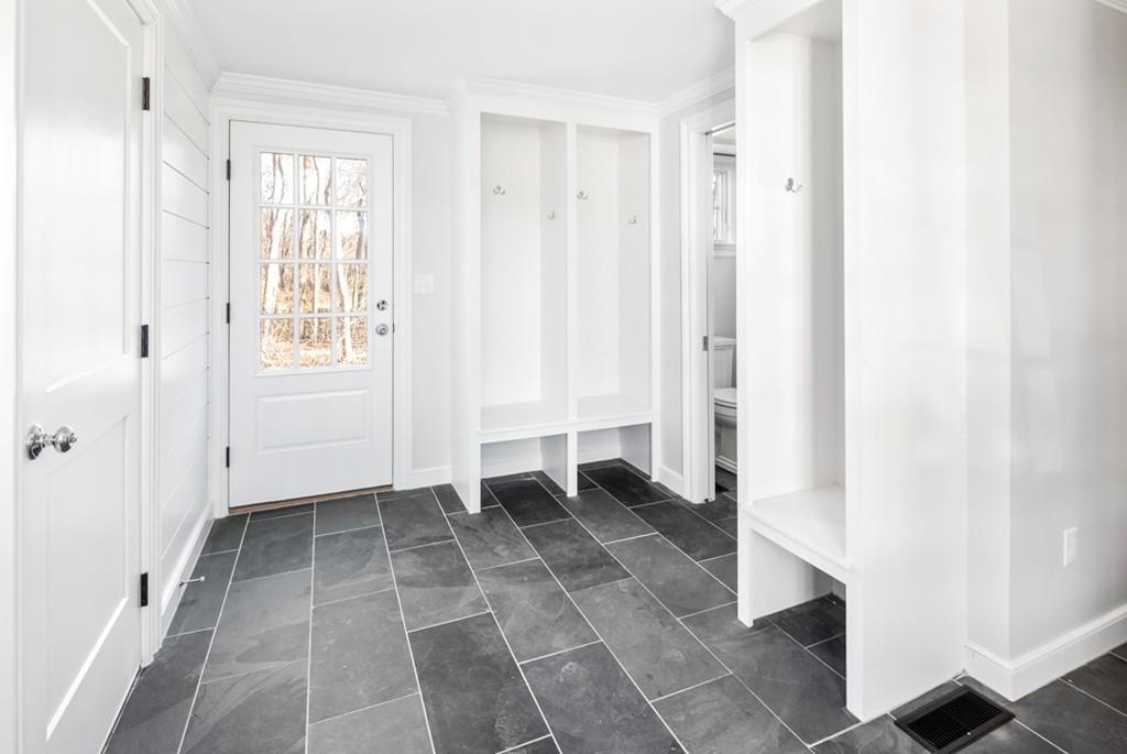 52 Union Street Hingham, MA 02043 - Photo 10 of 21 a view of a room with a window and brick walls